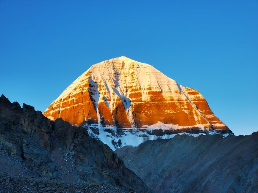 Stunning view of Mount Kailash illuminated by the sunrise, a majestic natural wonder.