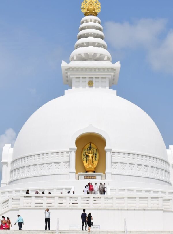 Breathtaking capture of Lumbini's iconic World Peace Pagoda against a clear sky.