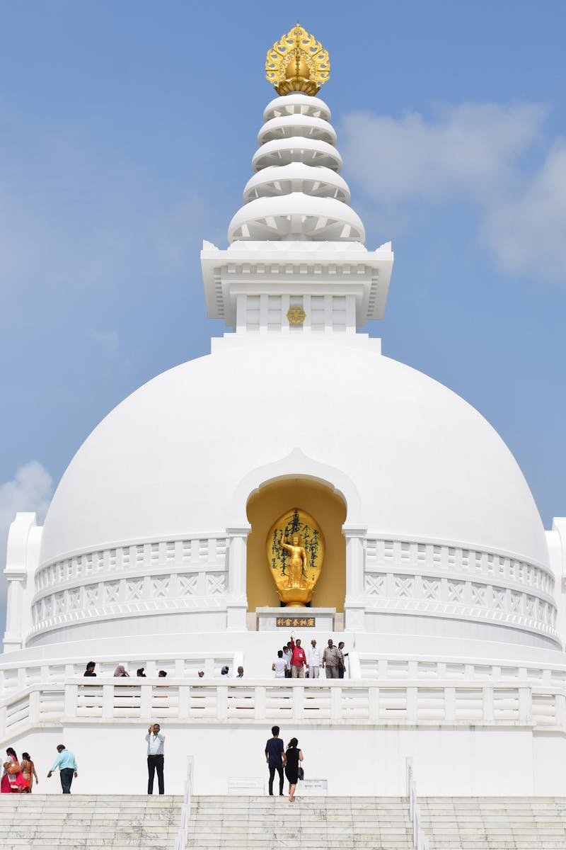 Breathtaking capture of Lumbini's iconic World Peace Pagoda against a clear sky.